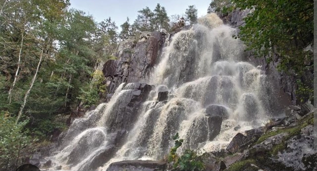 Waterfall and Plateau and Cave